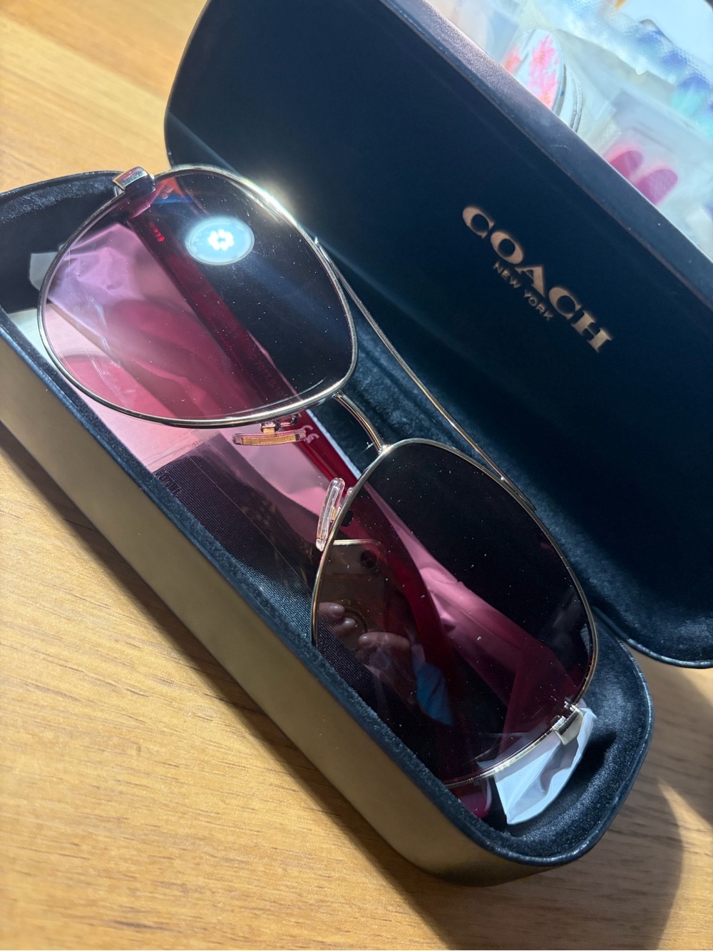 Coach Womens Aviator Sunglasses in Dark Pink and Gold